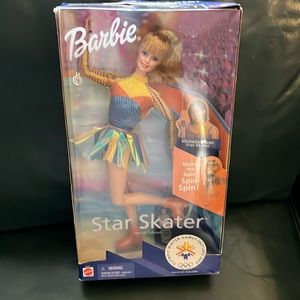 Brand new, never taken out of the box, Barbie star skater that spins